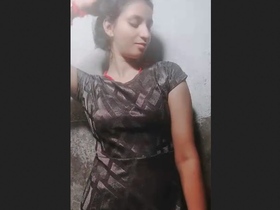 A seductive and attractive Indian teen performs on camera with flair and poise