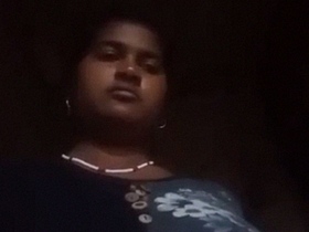 Watch a beautiful woman strip naked in a solo video