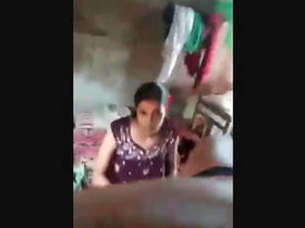 An Indian pair engages in intense lovemaking in a rural setting