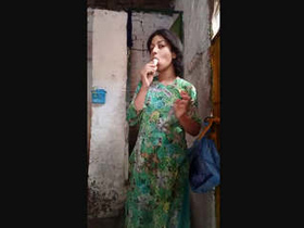 Aroused young woman tempts with her butt in a rural community