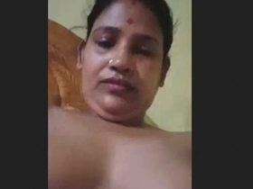South Asian aunty reveals her breasts and intimate area