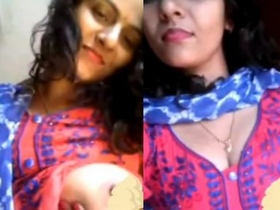 Bhabhi flaunts her big boobs in a seductive manner
