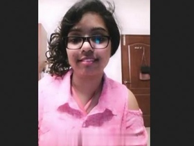 Sultry Indian babe flaunts her curves in a revealing outfit