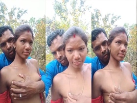 Tribal wife's big boobs bared in outdoor sex video