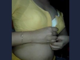 Sweetha, a cute desi bhabhi, shows off for her lover at night