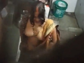 Secretly filmed married bhabi wearing saree after sex