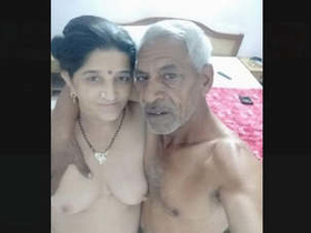 Experience the thrill of a young girl and an older Indian man in this steamy video