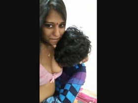 Indian girl with large breasts gives a messy blowjob to her partner
