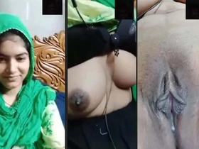 Watch a young college girl showcase her big tits and pussy in a VK video